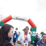runner crossing finish line