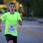 boy neon shirt running