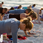 fitnation-sunset-yoga-on-the-beach