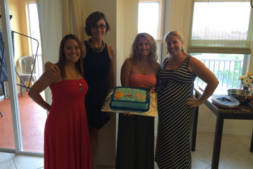 Pregnant woman with friends at shower