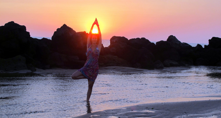 girl doing tree pose on the beach by Christopher Porter - Flickr