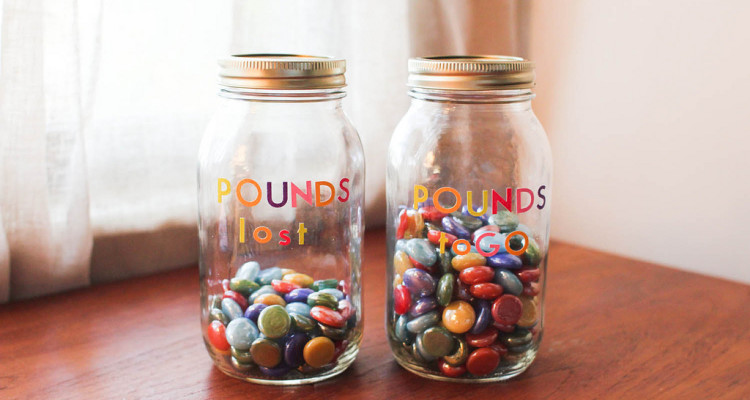 Colorful weight loss marbles in jars - Flickr - Melanie Levi